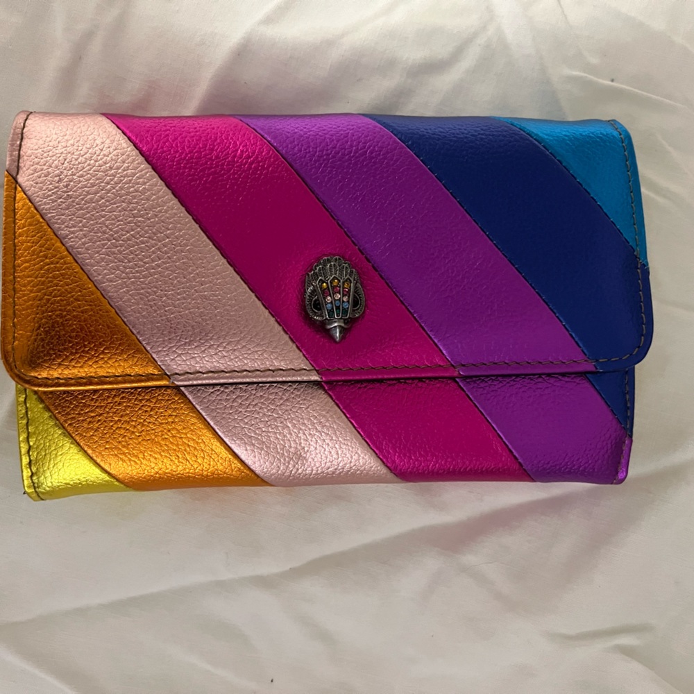 Kurt Gieger multi color crossbody with chain and peacock accent. Never used.